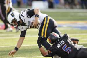 WVU quarterback situation still in flux after loss to Kansas